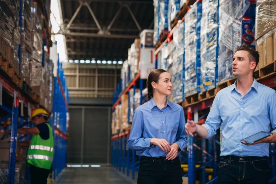 Warehouse worker working and checking the stock in the warehouse