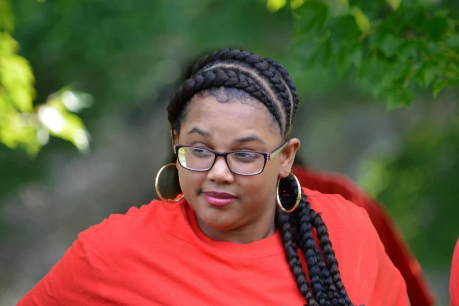 Close-Up Photography of Woman With Braided Hair