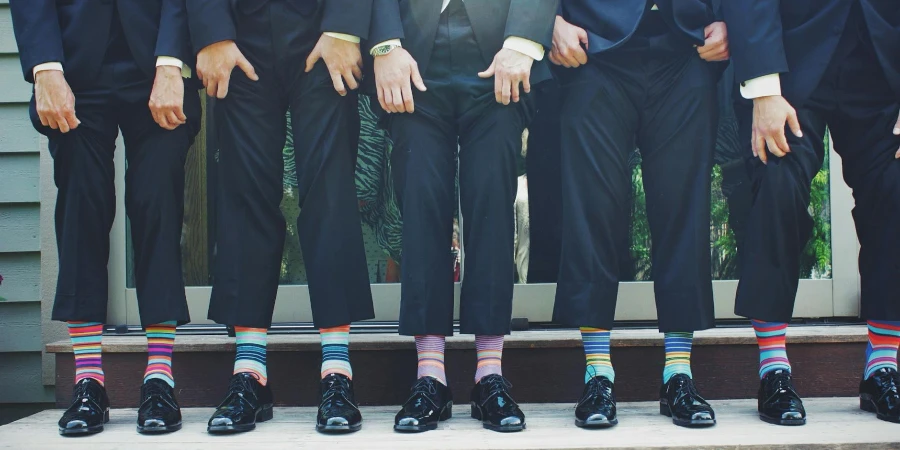 People Wearing Pair of Multicolored Socks