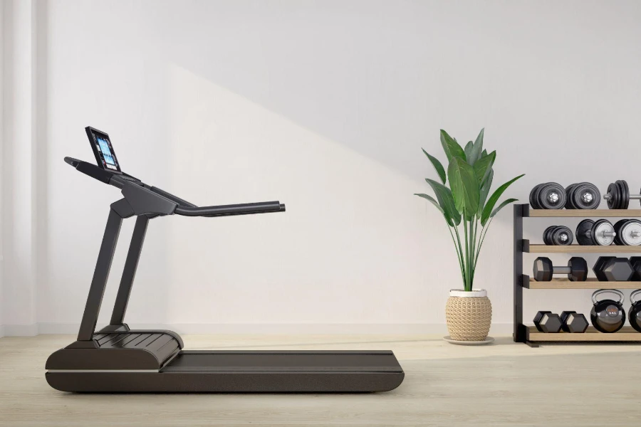 Treadmill in white room with dumbbell rack