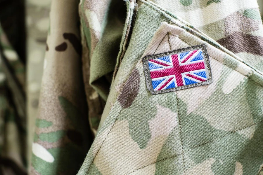Union Jack flag on the sleeve of British military camouflage uniform shirt sleeve