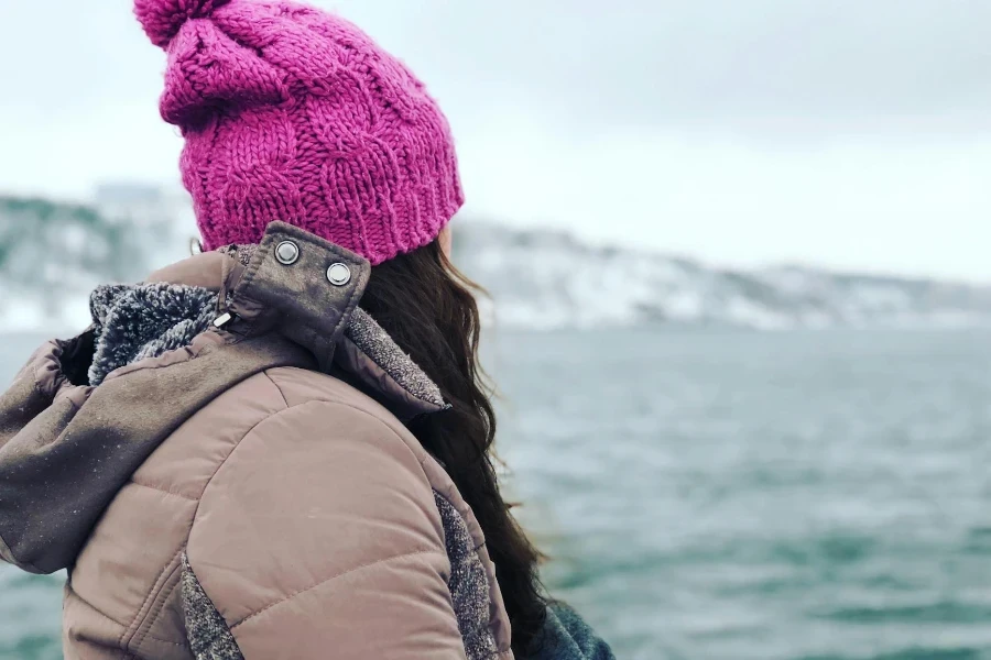 Photography of a Woman Wearing Pink Beanie