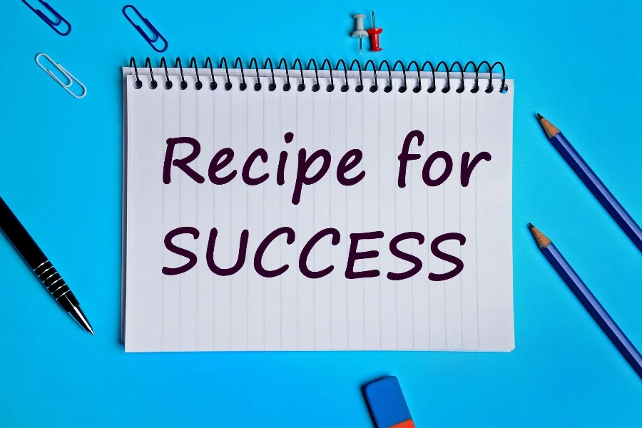 Recipe for success words on notebook page