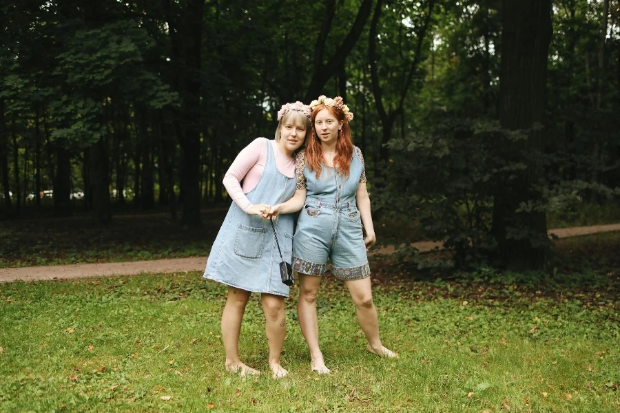 Women Wearing Flower Headbands Posing Together