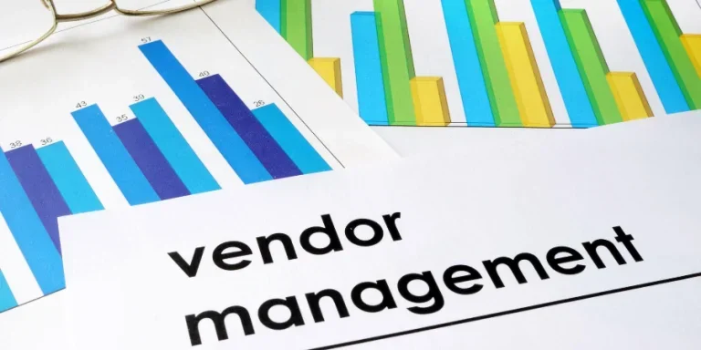 Paper with words Vendor management and charts.