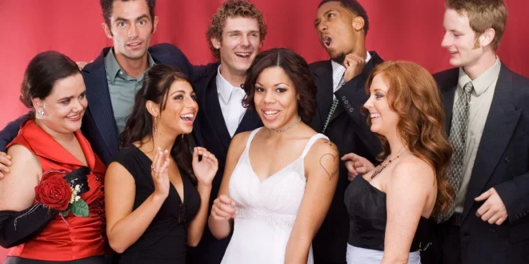 Group of friends at a party, laughing, having a great time.