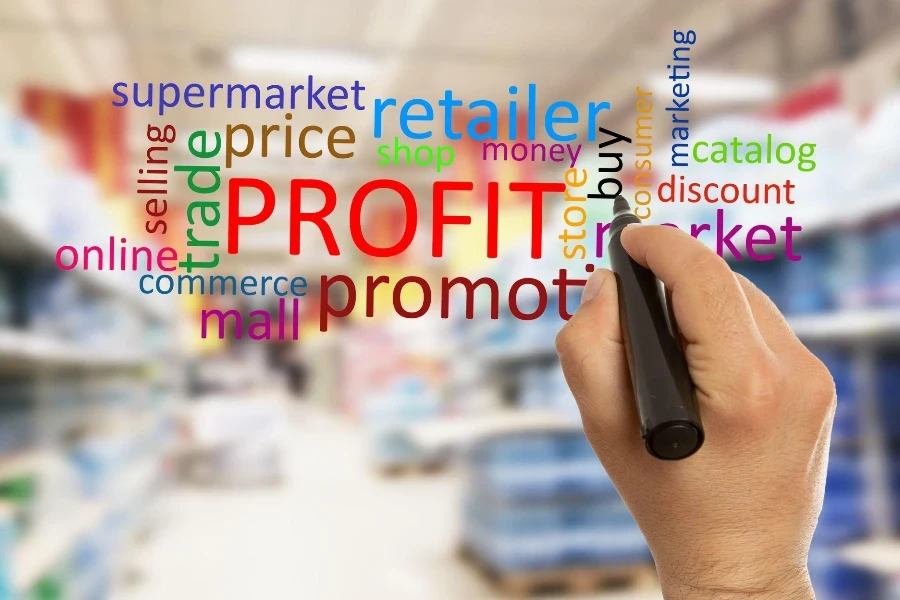 Hypermarket or supermarket worker man writing buy text on transparent glass screen with black marker closeup