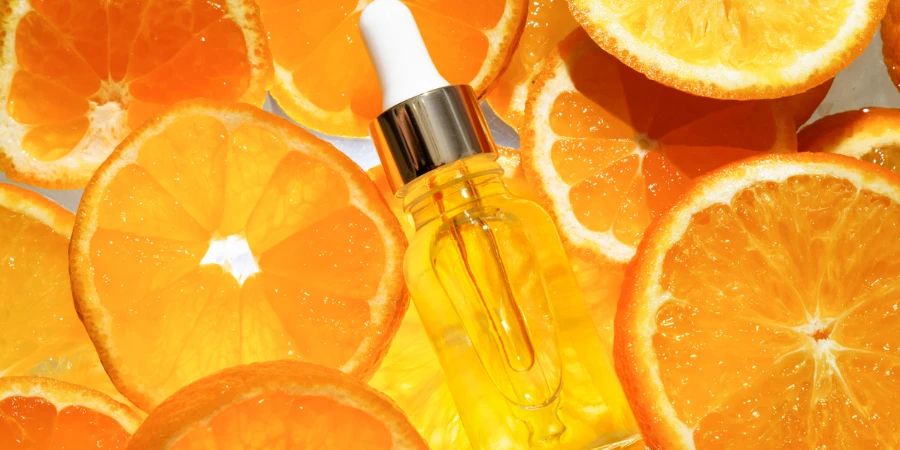 Facial serum in a glass bottle with vitamin C