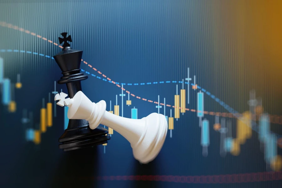 King chess pieces on financial data analysis graph.