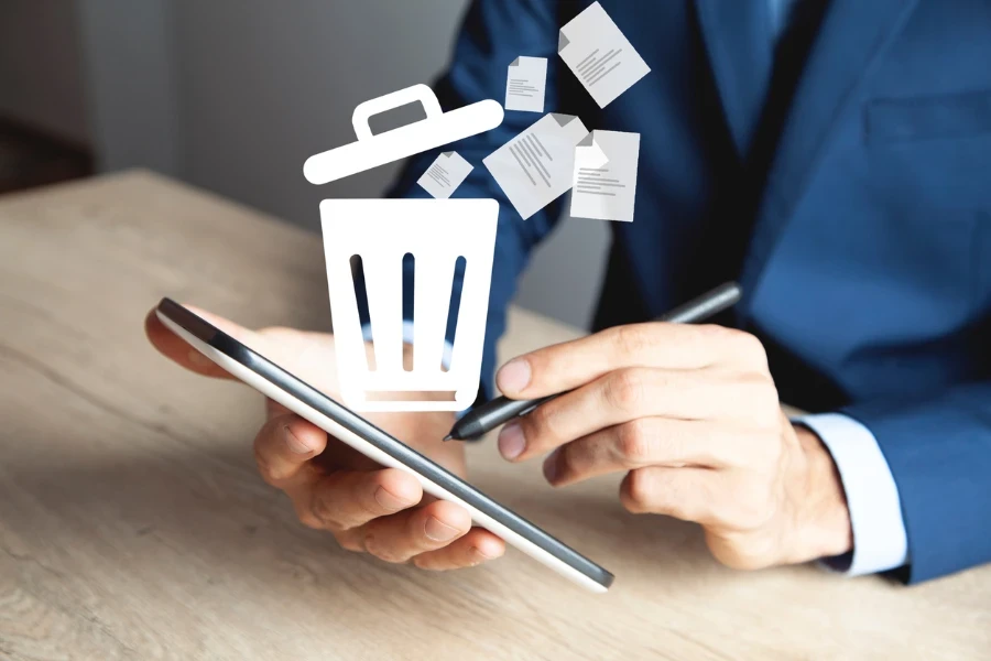 Person analyzing returns data on a smartphone