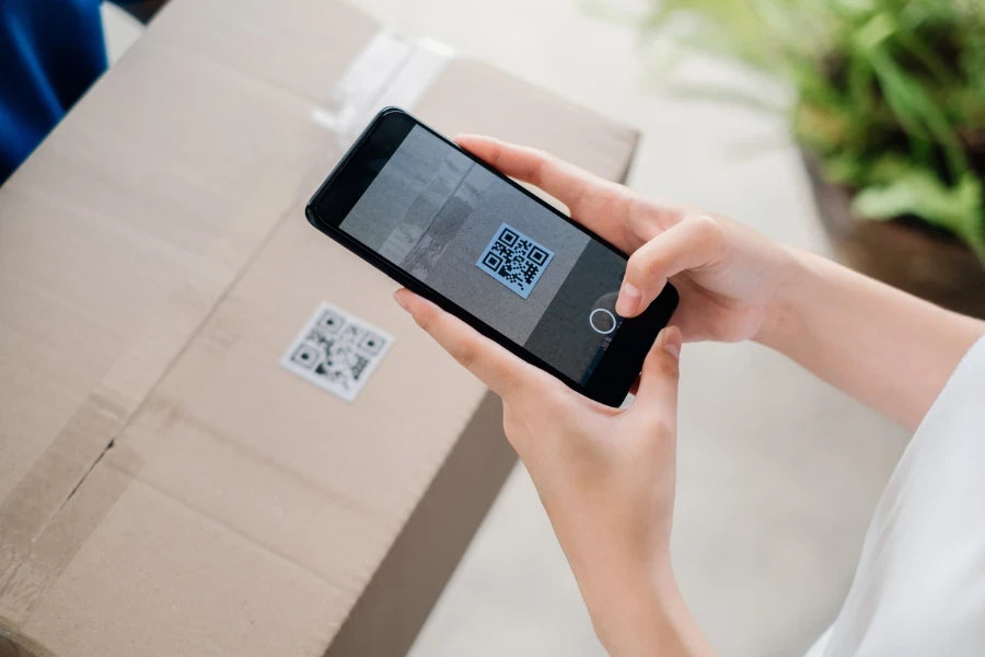 Person scanning a shipping label on their smartphone