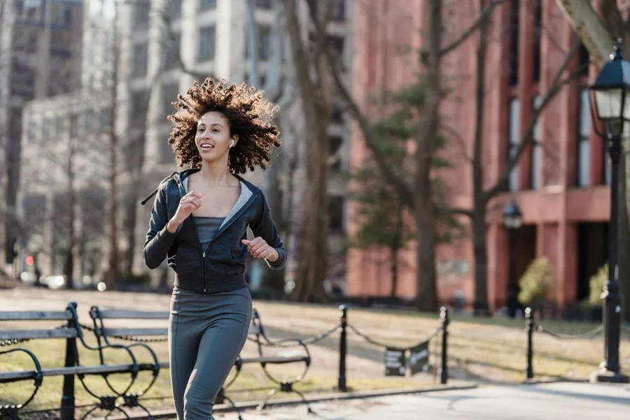 sport woman with earbuds