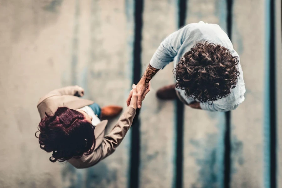 two people shaking hands