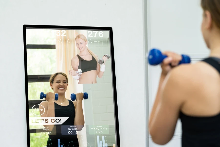 Woman working out in front of a fitness mirror