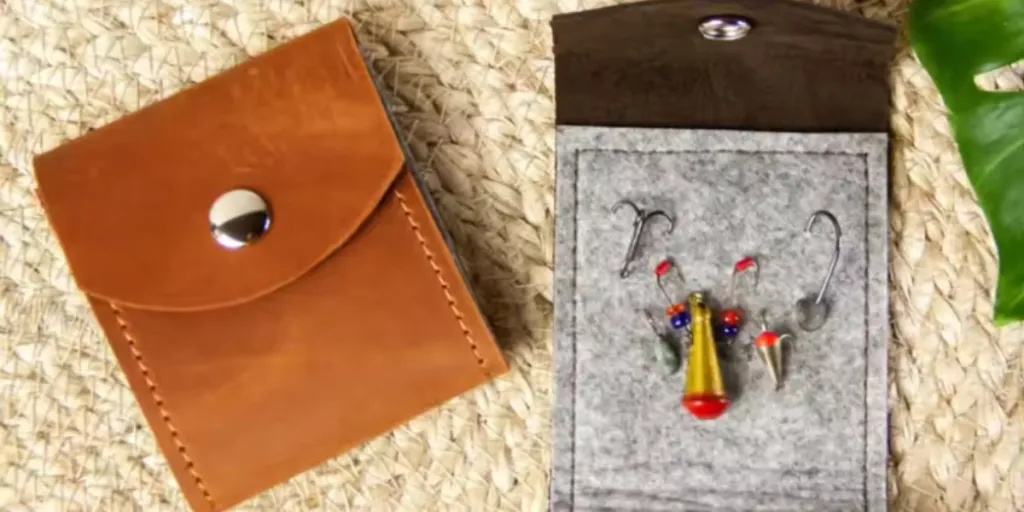 2 leather lure wallets with hooks inside one of them