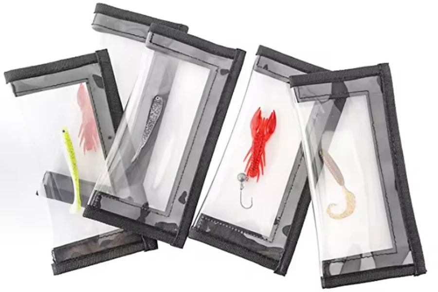 5 transparent lure wraps with lures inside of them