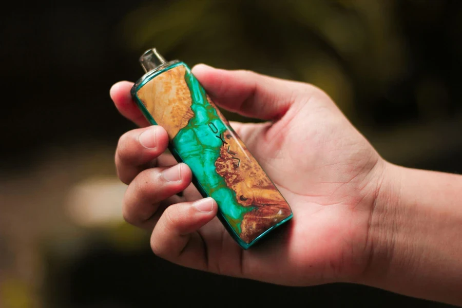 A Bright-Green Lighter in a Hand