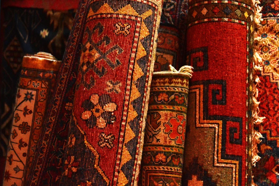 A Close-up of Various Oriental Rugs Showcasing Intricate Patterns and Vibrant Colors