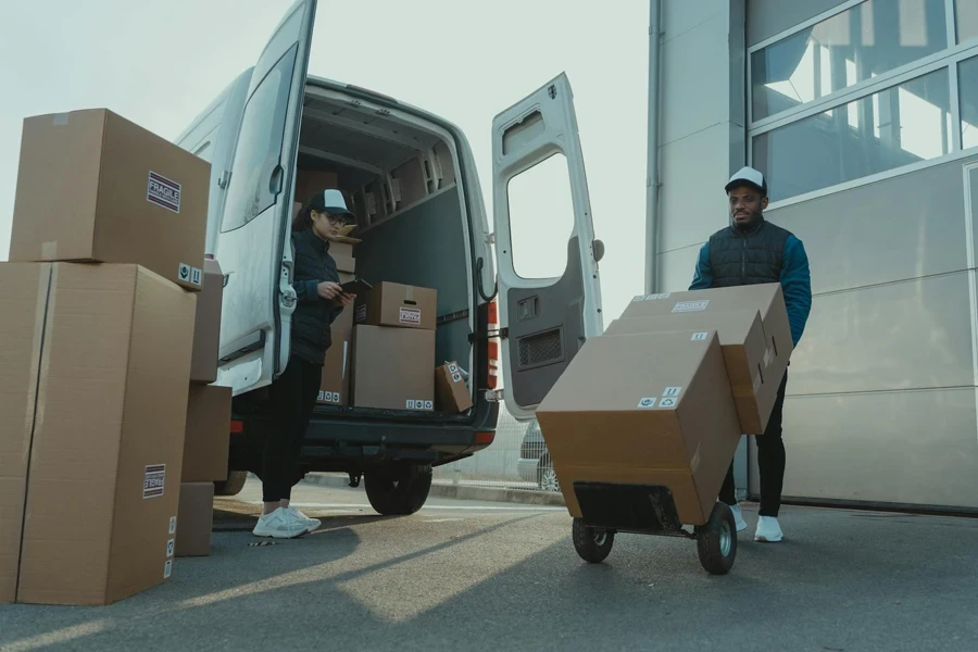 A Man and a Woman Working for a Delivery Company