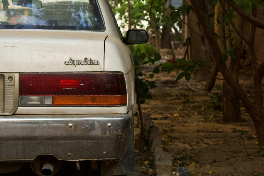 A White Car Parked on the Side of the Road