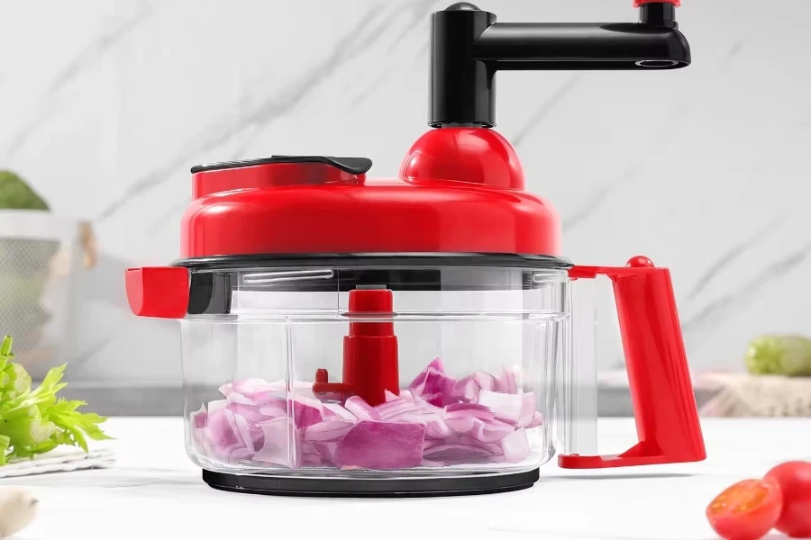 A food chopper with chopped onions inside