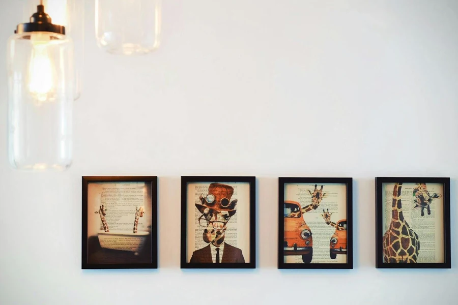A set of framed paintings on a white wall canvas