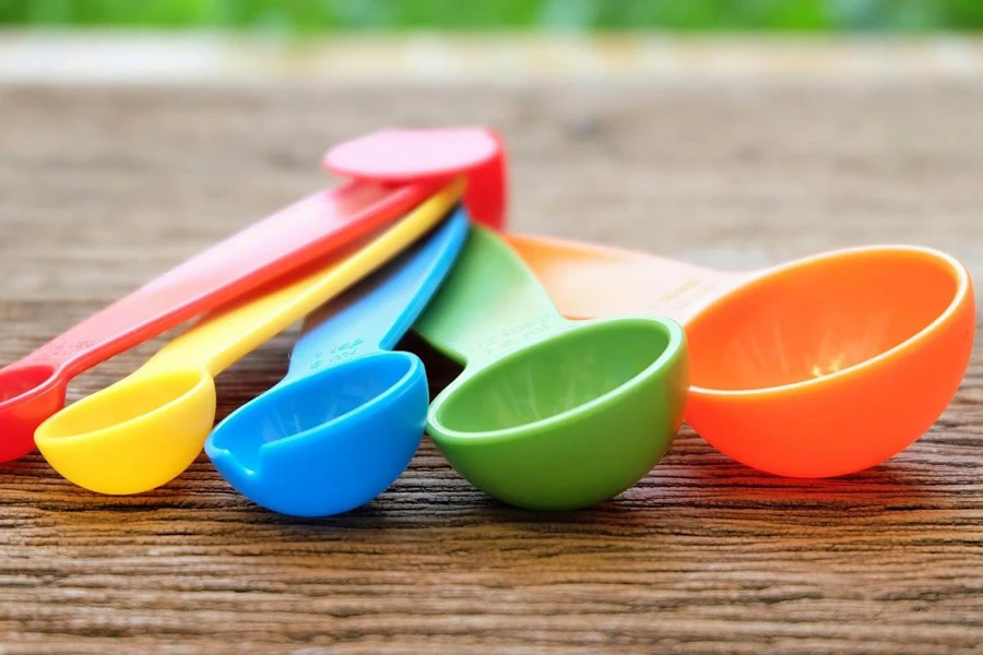 A set of multi-colored kitchen measuring spoons