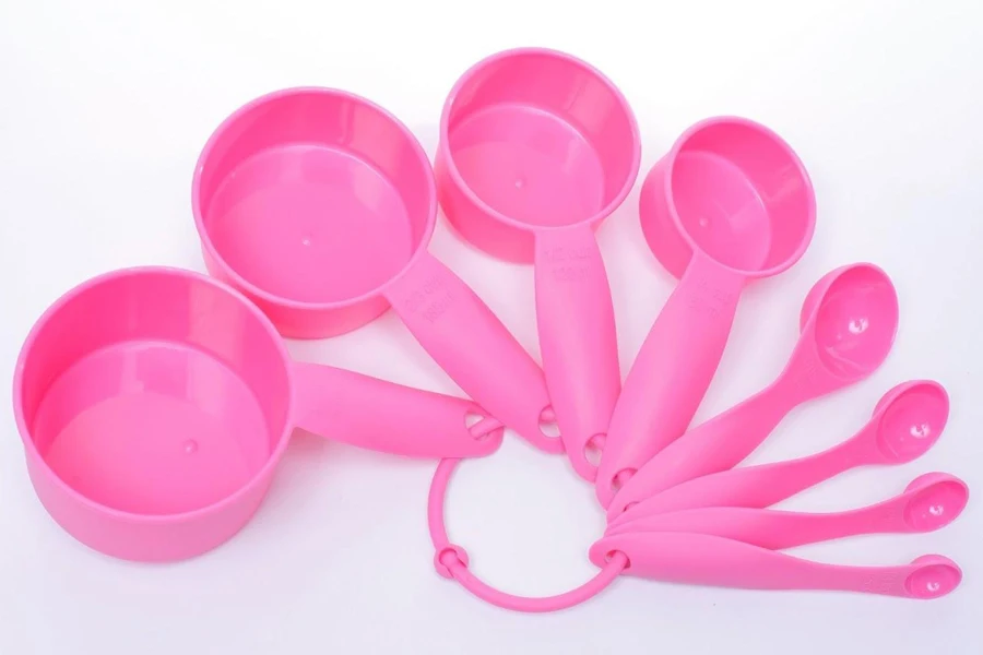 A set of pink measuring cups