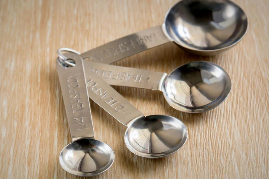 A set of stainless steel measuring cups