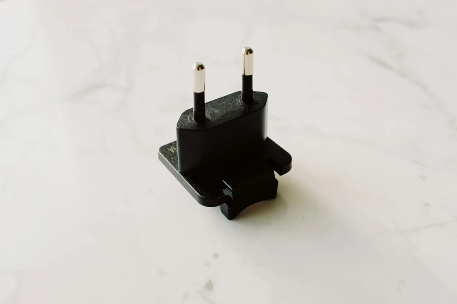 Black Adapter On White Surface