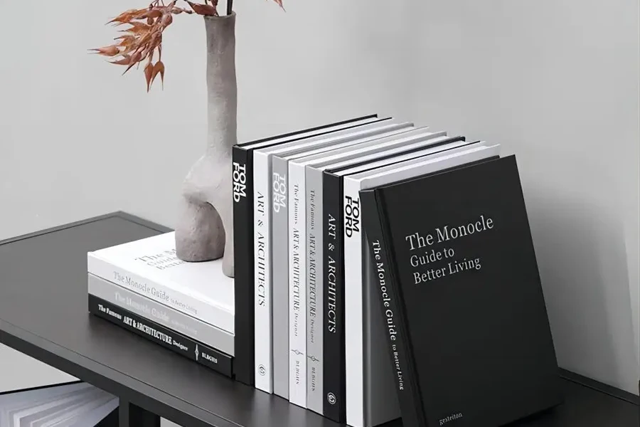 Black bedroom bookshelf and books with black and white covers