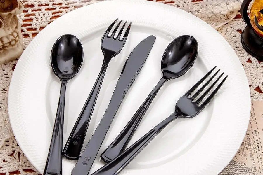 Black plastic disposable flatware set