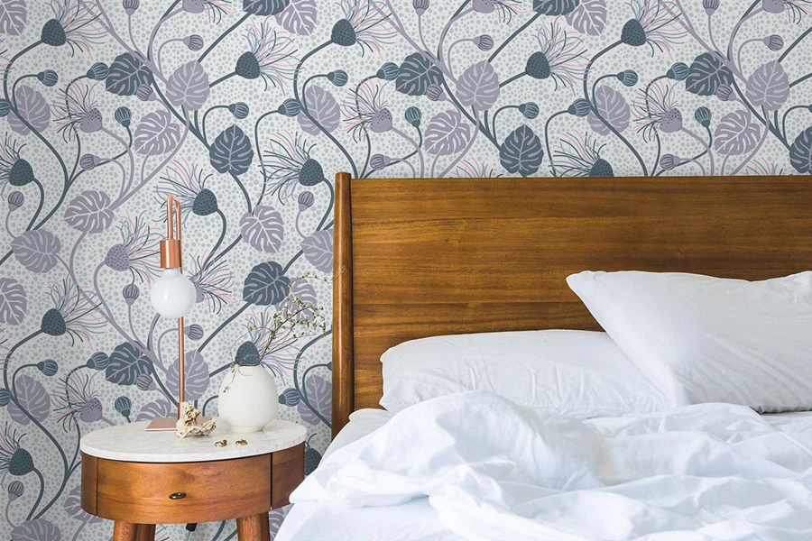 Botanical accent wallpaper placed on a bedroom wall