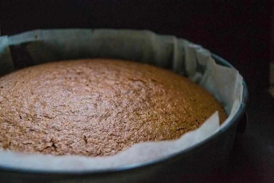 Cake inside round steel baking pan