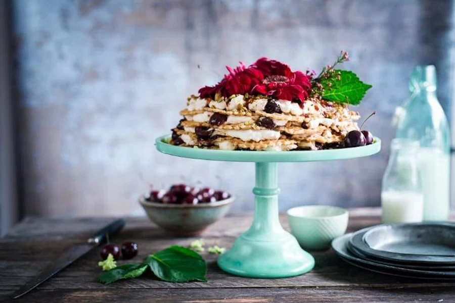 Cake on turquoise cake pedestal