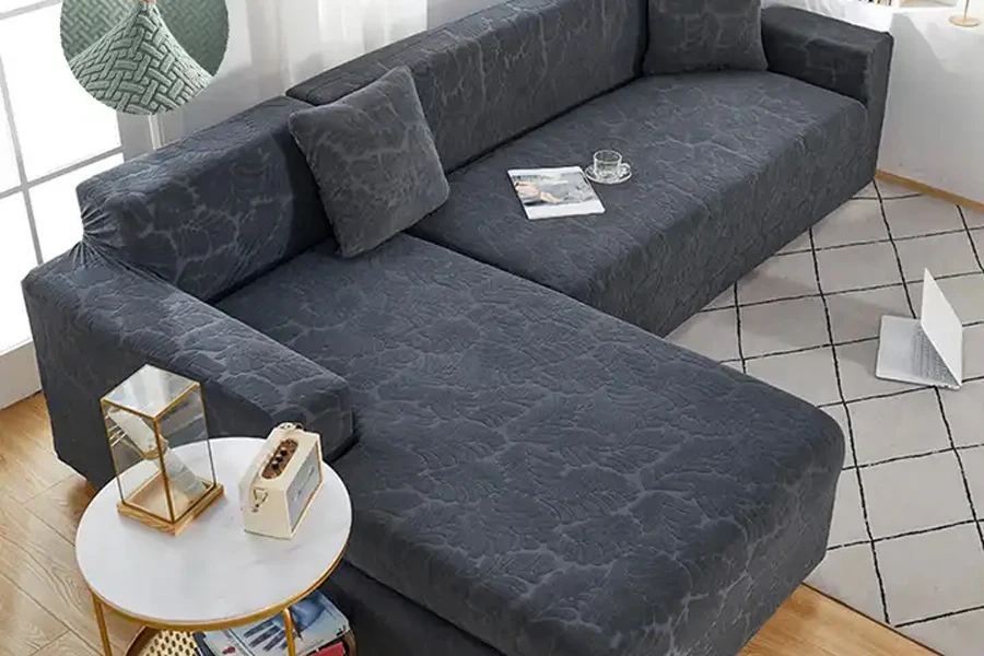 Charcoal colored patterned sofa slipcover on L-shaped couch