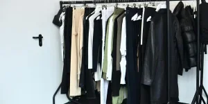 Collection of garments hanging on rack