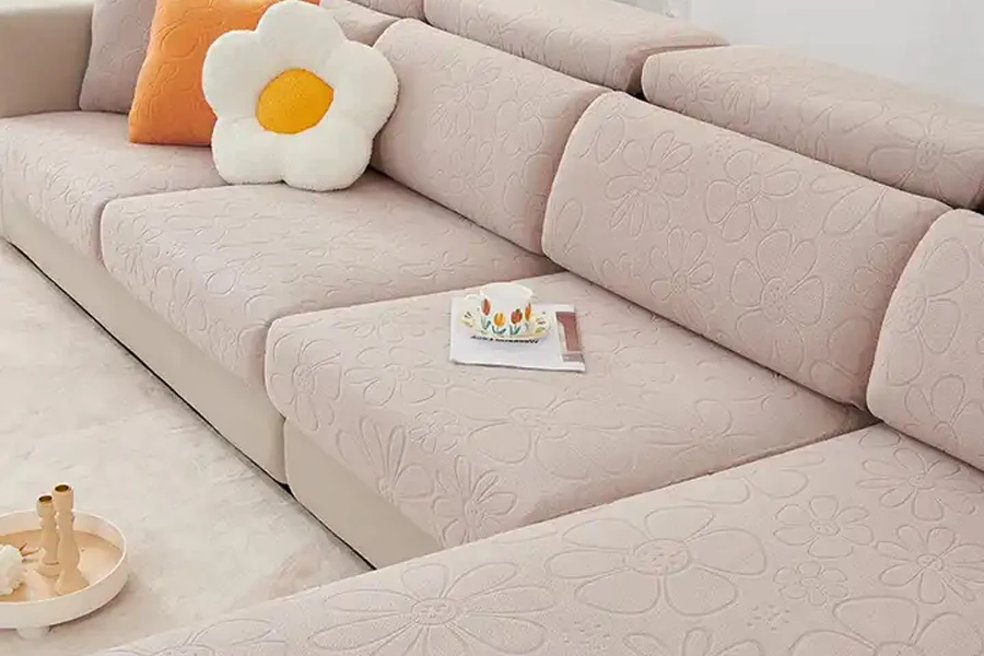 Cream-colored couch slipcovers on large L-shaped sofa
