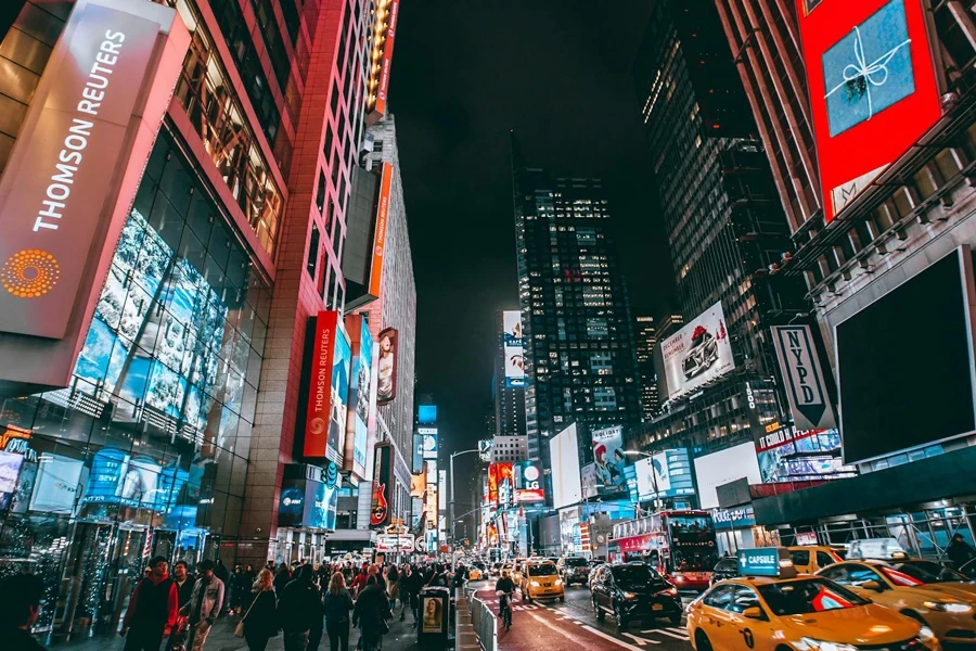 Crowd of People on Street during Night Time