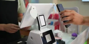 Customers are using mobile phones to pay