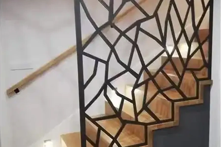 Customized stainless steel screen mounted as a wall along staircase
