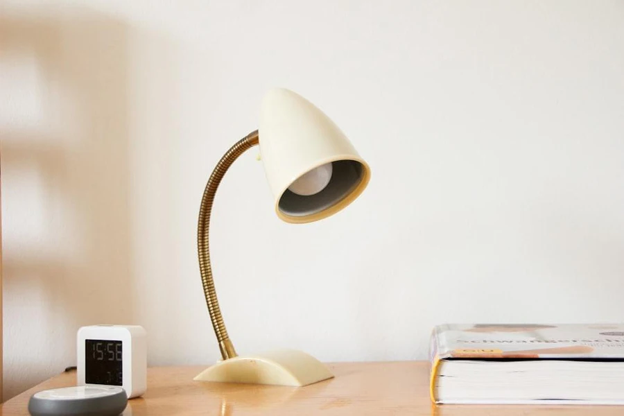 Desk with modern curved task light