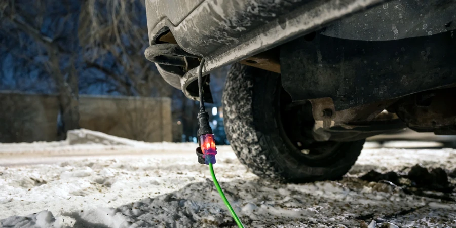 Extension cord plugged into truck in winter