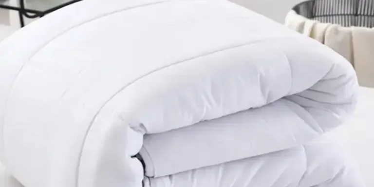 Folded white quilted duvet inner