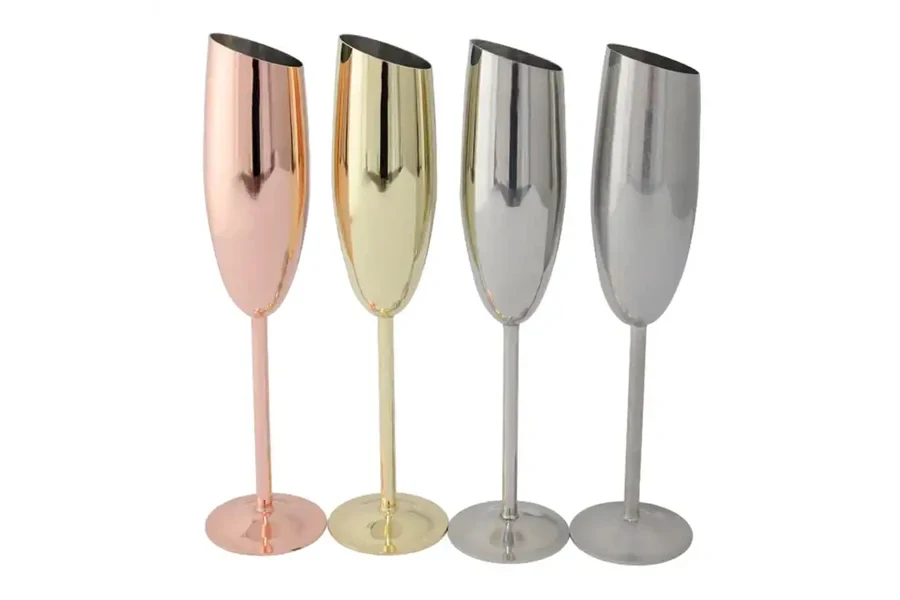 Four stainless steel flutes in rose, gold, and silver