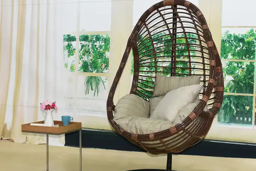 Free-standing polyethylene wicker and metal swing egg chair