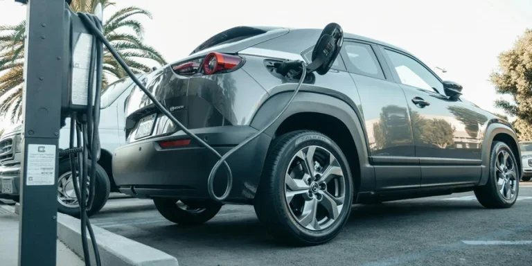 Gray Electric Car Parked on a Charging Bay