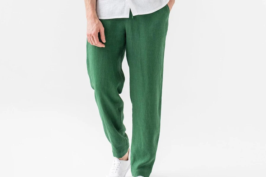 Man wearing green linen pants