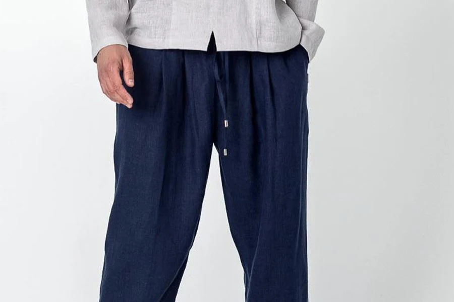 Man wearing super-relaxed blue drawstring pants