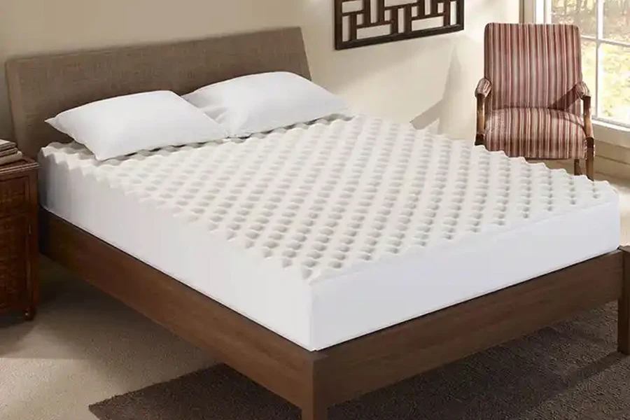Natural white latex mattress topper on double bed